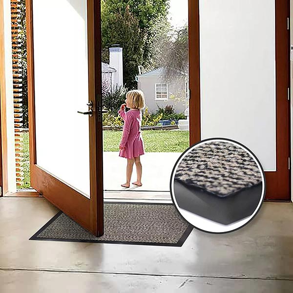 Beige and black heavy duty barrier mat