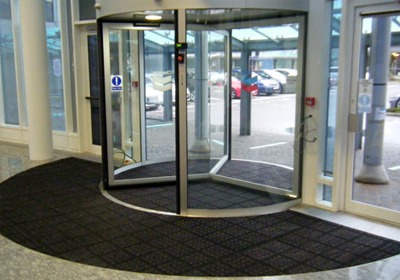 Industrial entrance mat placed at a busy commercial doorway