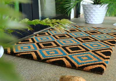 Modern smart door mat at the entrance of a UK home, stylish and dirt-trapping