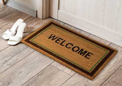 Durable outdoor coir doormat on UK doorstep – non-shedding, anti-curl, weatherproof